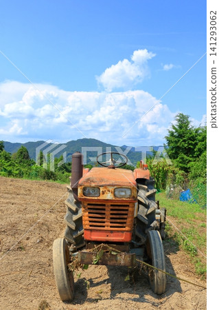 A well-worn tractor A well-worn tractor 141293062