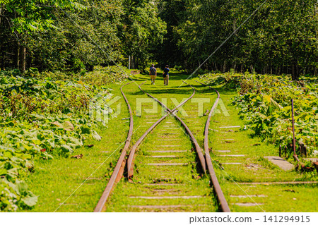 The rusty rails of the former Horoka Station and the summer clouds evoke a nostalgic sense of railway history. The rusty rails of the former Horoka Station and the summer clouds evoke a nostalgic sense of railway history. 141294915