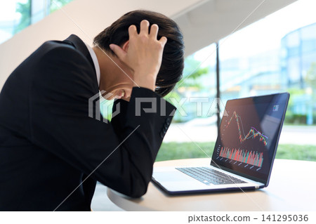 Asian investors despair over falling stock prices Asian investors despair over falling stock prices 141295036