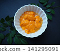 Fresh sea urchin from Hokkaido served in a small bowl 141295091