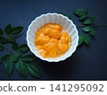 Fresh sea urchin from Hokkaido served in a small bowl 141295092