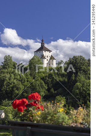 New Castle Banska Stiavnica Slovakia with flowers and blue sky New Castle Banska Stiavnica Slovakia with flowers and blue sky 141295440
