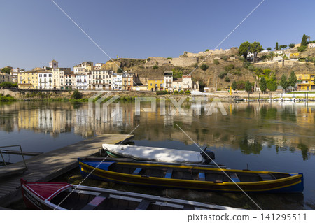 Ebro River flowing past Mora d'Ebre town in Catalonia Ebro River flowing past Mora d'Ebre town in Catalonia 141295511