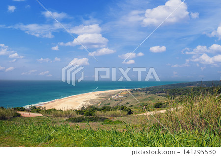 Atlantic Ocean. Beach in Nazare, Portugal, Europe Atlantic Ocean. Beach in Nazare, Portugal, Europe 141295530