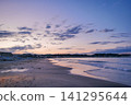 Waiting for dawn on the beach 141295644