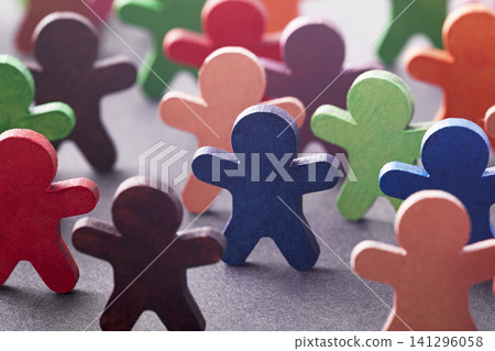 Colorful painted group of wooden people figures Colorful painted group of wooden people figures 141296058