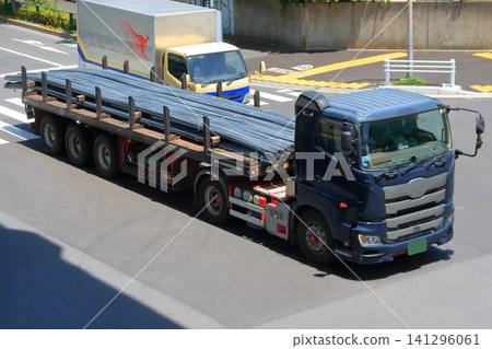 Image of a trailer truck transporting reinforcing bars. Image of a trailer truck transporting reinforcing bars. 141296061
