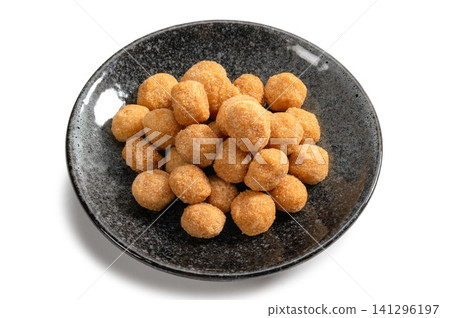 Macadamia nut caramel sugar 141296197
