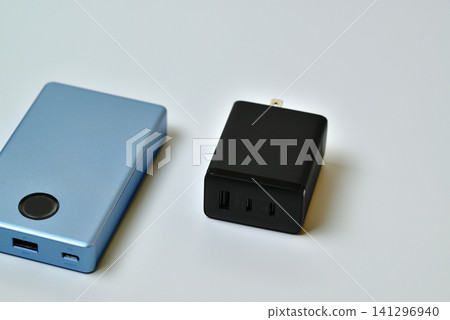 Mobile battery for charging smartphones (external battery) - White background 141296940