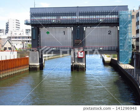 A view of the Shin-Onagigawa floodgate, standing near the confluence of the Onagigawa River and the Sumida River. A view of the Shin-Onagigawa floodgate, standing near the confluence of the Onagigawa River and the Sumida River. 141296948