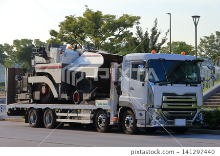 Image of an asphalt finisher transport vehicle. Image of an asphalt finisher transport vehicle. 141297440