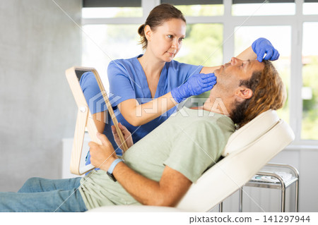 Attending medical consultation. Attending medical consultation. 141297944