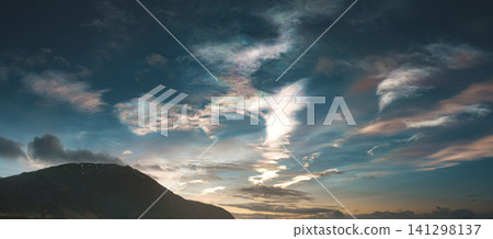 Mesmerizing polar stratospheric clouds over Hornafjordur in south Iceland. Mesmerizing polar stratospheric clouds over Hornafjordur in south Iceland. 141298137