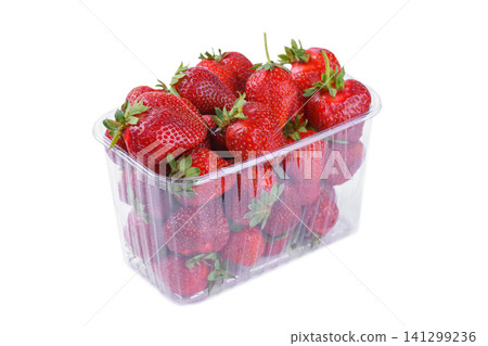 Fresh red strawberry in plastic punnet or transparent box, container isolated on white background Fresh red strawberry in plastic punnet or transparent box, container isolated on white background 141299236