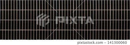 Vertical black finger tiles wall with light beige grout lines texture Vertical black finger tiles wall with light beige grout lines texture 141300060