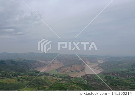 Aerial panoramic view of the Yellow River meandering through a canyon — Inner Mongolia Aerial panoramic view of the Yellow River meandering through a canyon — Inner Mongolia 141300214