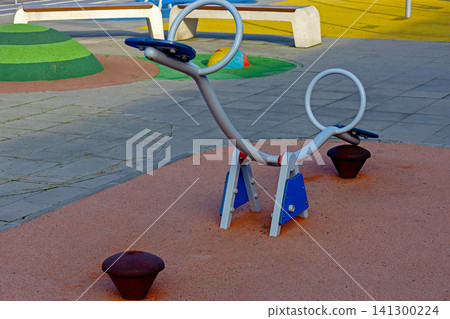Modern seesaw in children playground 141300224