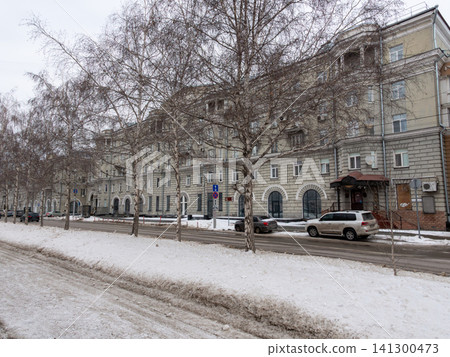 March 22 2026 Barnaul Russia Lenina Avenue with beautiful historic buildings covered in snow cold early spring urban cityscape classic architecture and winter atmosphere. March 22 2026 Barnaul Russia Lenina Avenue with beautiful historic buildings covered in snow cold early spring urban cityscape classic architecture and winter atmosphere. 141300473