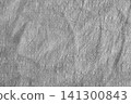 Soft gray fabric texture with subtle wrinkles and creases for background or design use 141300843