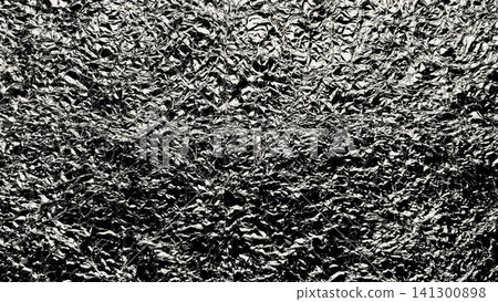 crumpled silver aluminum foil background reflecting bright studio light to create a textured metallic abstract pattern crumpled silver aluminum foil background reflecting bright studio light to create a textured metallic abstract pattern 141300898
