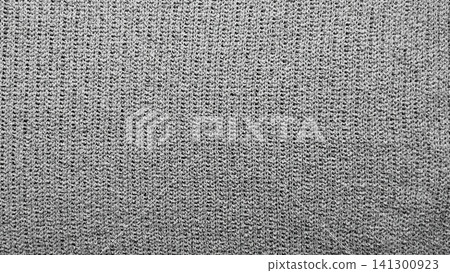 textured grey knit fabric background shows detailed woven wool yarn in a minimalist flat lay pattern textured grey knit fabric background shows detailed woven wool yarn in a minimalist flat lay pattern 141300923