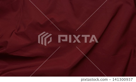 deep burgundy cloth texture featuring soft wrinkles and flowing drapes to create a luxurious warm abstract background deep burgundy cloth texture featuring soft wrinkles and flowing drapes to create a luxurious warm abstract background 141300937