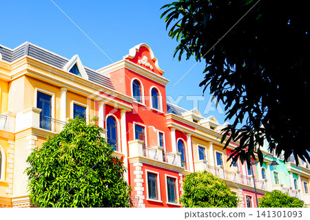 European style building architecture. Colorful building under a clear blue sky background. European style building architecture. Colorful building under a clear blue sky background. 141301093