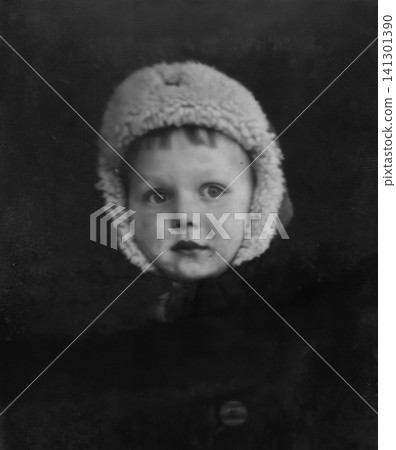 Vintage Studio Portrait of a Three-Year-Old Boy in a Winter Bonnet Vintage Studio Portrait of a Three-Year-Old Boy in a Winter Bonnet 141301390