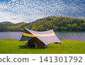 Under the autumn sky, a refreshing lakeside campsite 141301792