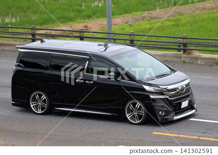 Image of a luxury black minivan Image of a luxury black minivan 141302591