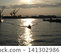 Fishing boat on its way back 141302986