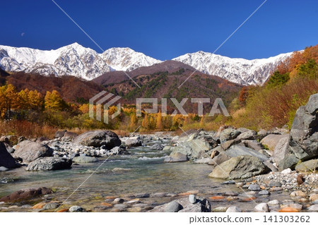 A view of the snow-capped peaks of Hakuba from Hakuba Village in autumn. A view of the snow-capped peaks of Hakuba from Hakuba Village in autumn. 141303262