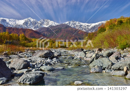 A view of the snow-capped peaks of Hakuba from Hakuba Village in autumn. A view of the snow-capped peaks of Hakuba from Hakuba Village in autumn. 141303297