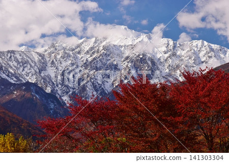 A view of the snow-capped peaks of Hakuba from Hakuba Village in autumn. A view of the snow-capped peaks of Hakuba from Hakuba Village in autumn. 141303304