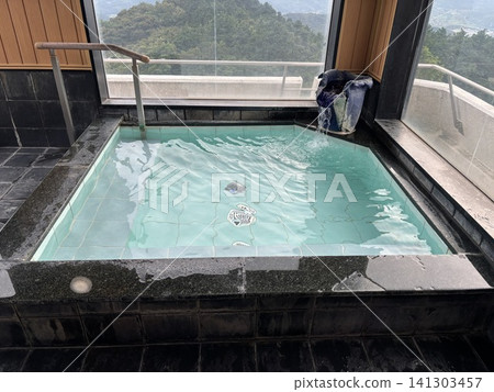 A hot spring with a view of the sea A hot spring with a view of the sea 141303457