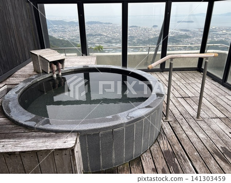 A hot spring with a view of the sea A hot spring with a view of the sea 141303459