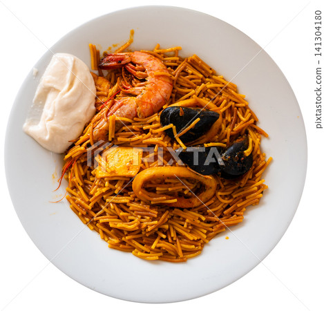Buckwheat noodles with seafood and vegetables, close up Buckwheat noodles with seafood and vegetables, close up 141304180