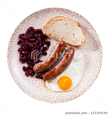 Portion of breakfast food is fried egg and pork sausage with stewed beans Portion of breakfast food is fried egg and pork sausage with stewed beans 141304249