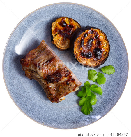 Delicious pork ribs with stewed eggplant on plate Delicious pork ribs with stewed eggplant on plate 141304297