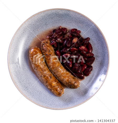 Hot delicious sausages with beans and parsley on plate Hot delicious sausages with beans and parsley on plate 141304337
