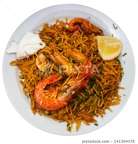 Fideua with seafood served on platter Fideua with seafood served on platter 141304376