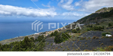 View from the San Antonio volcano on the Canary Island of La Palma of the settlements below, agricultural fields, and the ocean. High quality photo View from the San Antonio volcano on the Canary Island of La Palma of the settlements below, agricultural fields, and the ocean. High quality photo 141304794