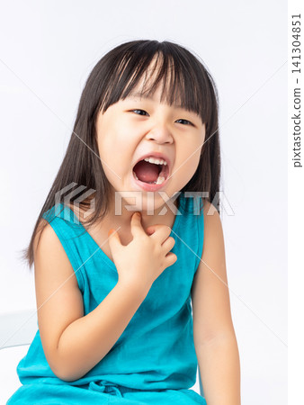 Asian child scratching her neck, concept of skin allergy, itchiness or irritation. Asian child scratching her neck, concept of skin allergy, itchiness or irritation. 141304851