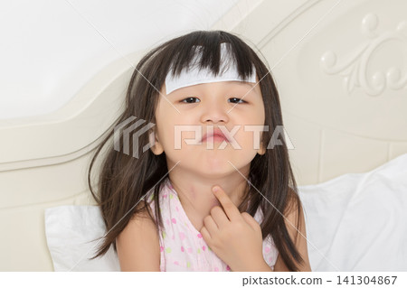 Asian Little Girl with Sore Throat and Fever Feeling Pain 141304867