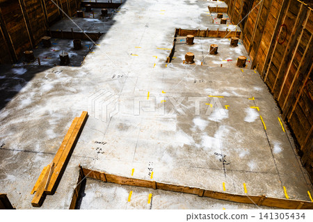 Foundation work in the basement of a building; high color saturation contrast 141305434