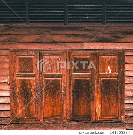 Rustic old brown wood window frame with beautiful texture in warm light Rustic old brown wood window frame with beautiful texture in warm light 141305884