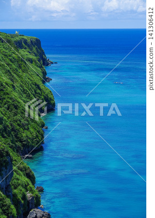 The cliffs and deep blue sea on the northern coast of Irabu Island The cliffs and deep blue sea on the northern coast of Irabu Island 141306412