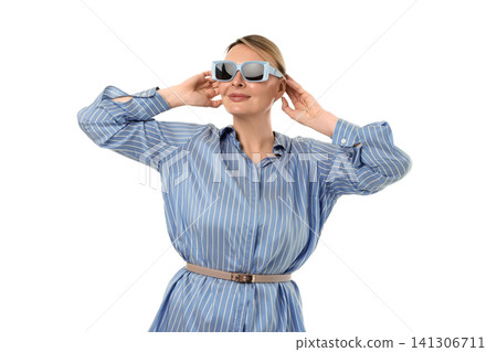 Confident woman in striped shirt & shades, isolated on white, PNG Confident woman in striped shirt & shades, isolated on white, PNG 141306711