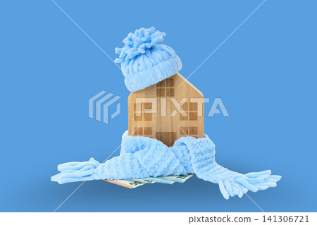 Wooden house adorned for heating season warmth Wooden house adorned for heating season warmth 141306721