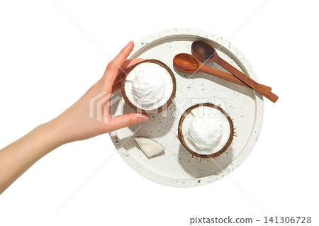 Coconut desserts served in shells, isolated on white, PNG Coconut desserts served in shells, isolated on white, PNG 141306728